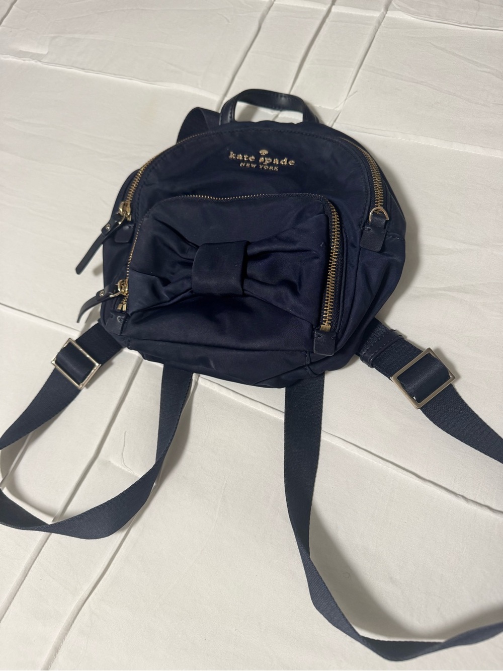 kate spade navy bow mini backpack